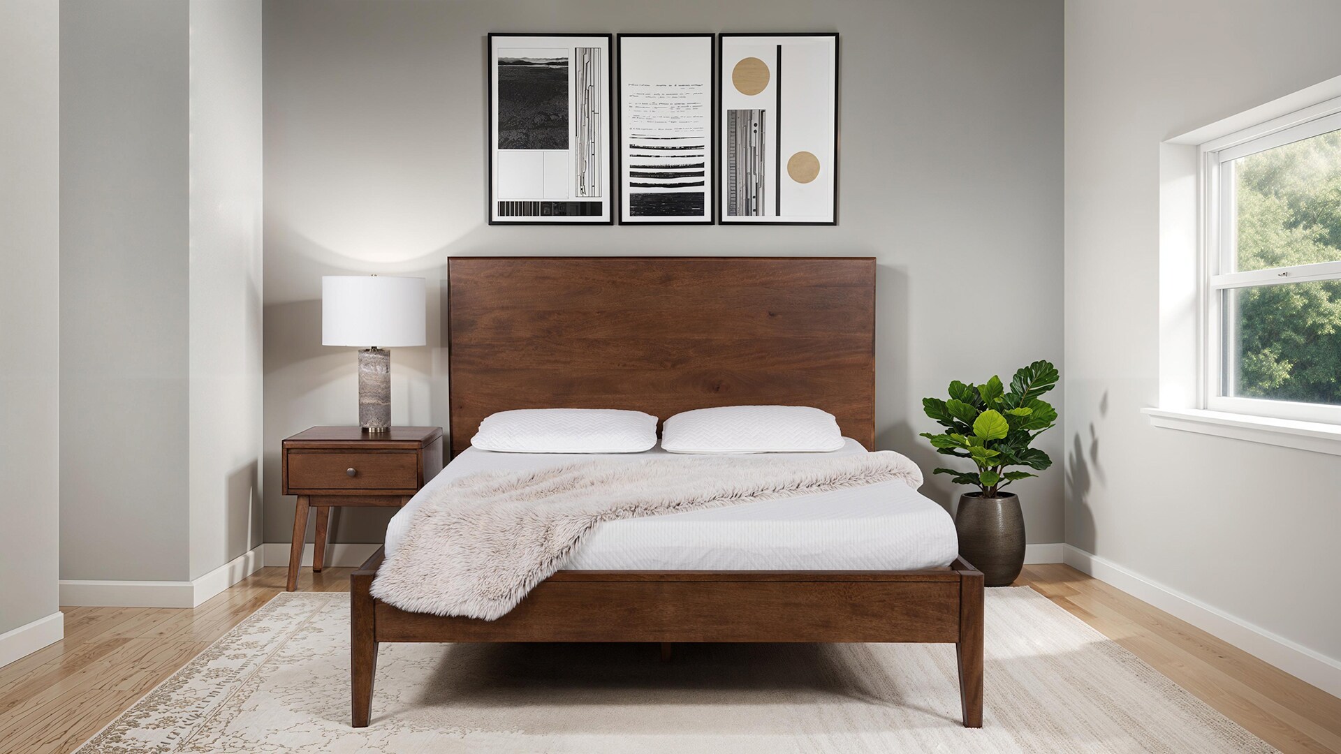 Modern bedroom with wooden bed, white bedding, framed wall art, and a floor lamp