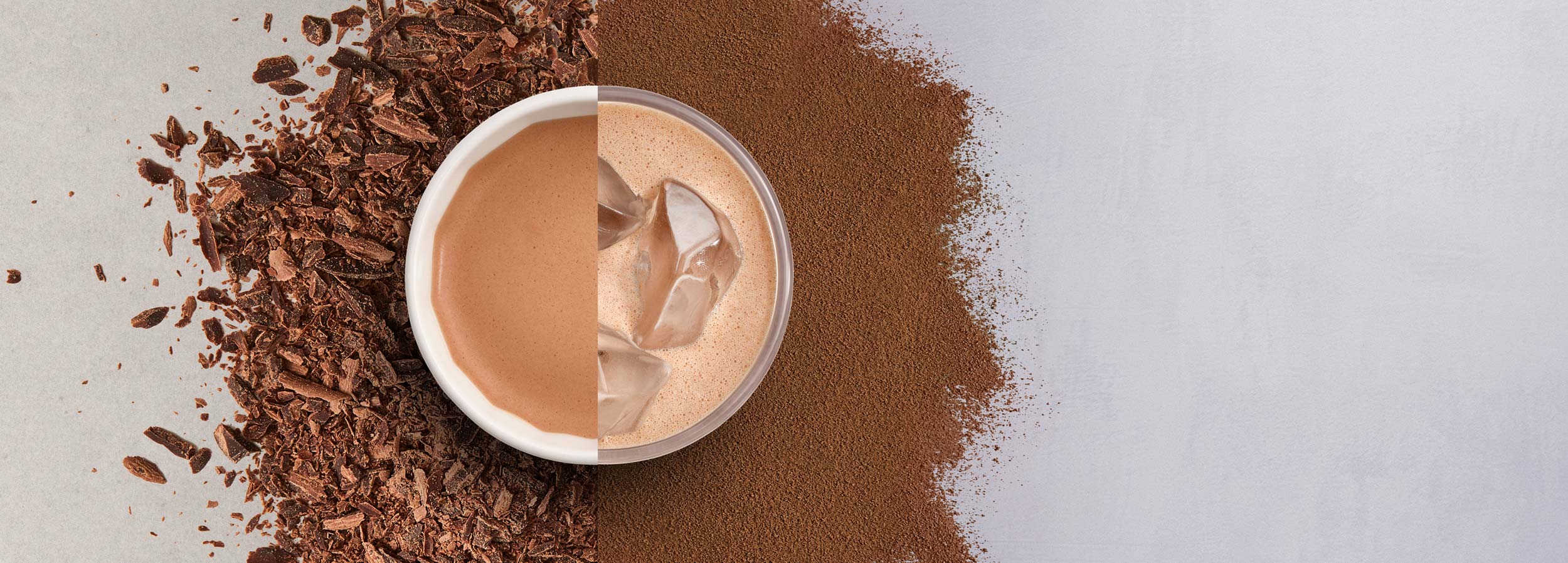 Compact foundation in open container with powder scattered around on a surface