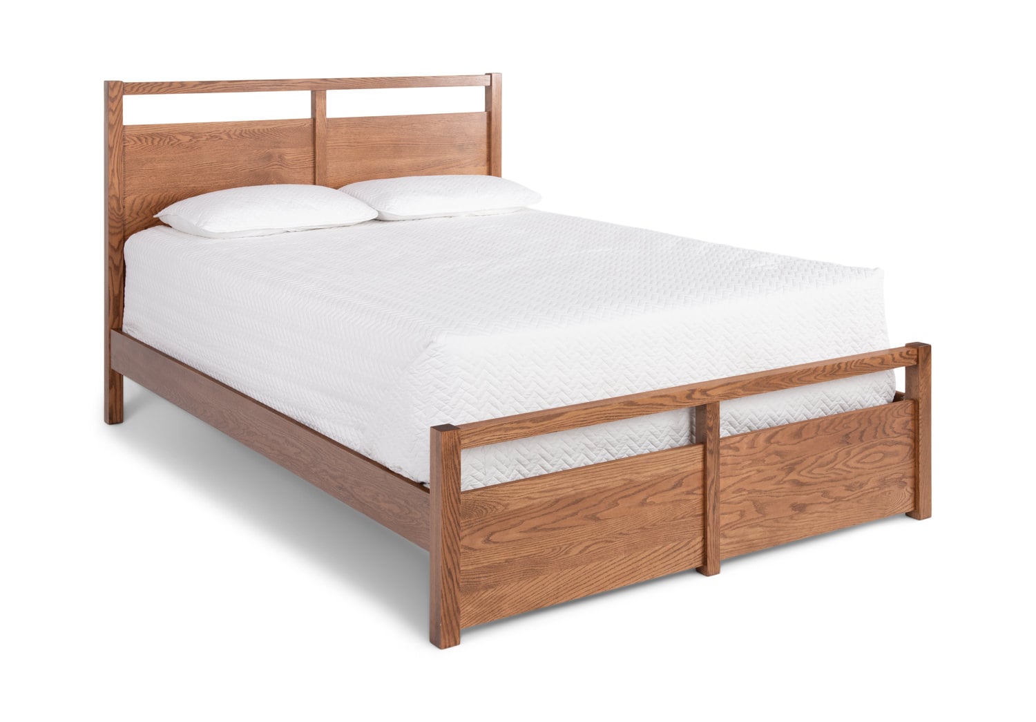 Wooden double bed with white mattress on a white background