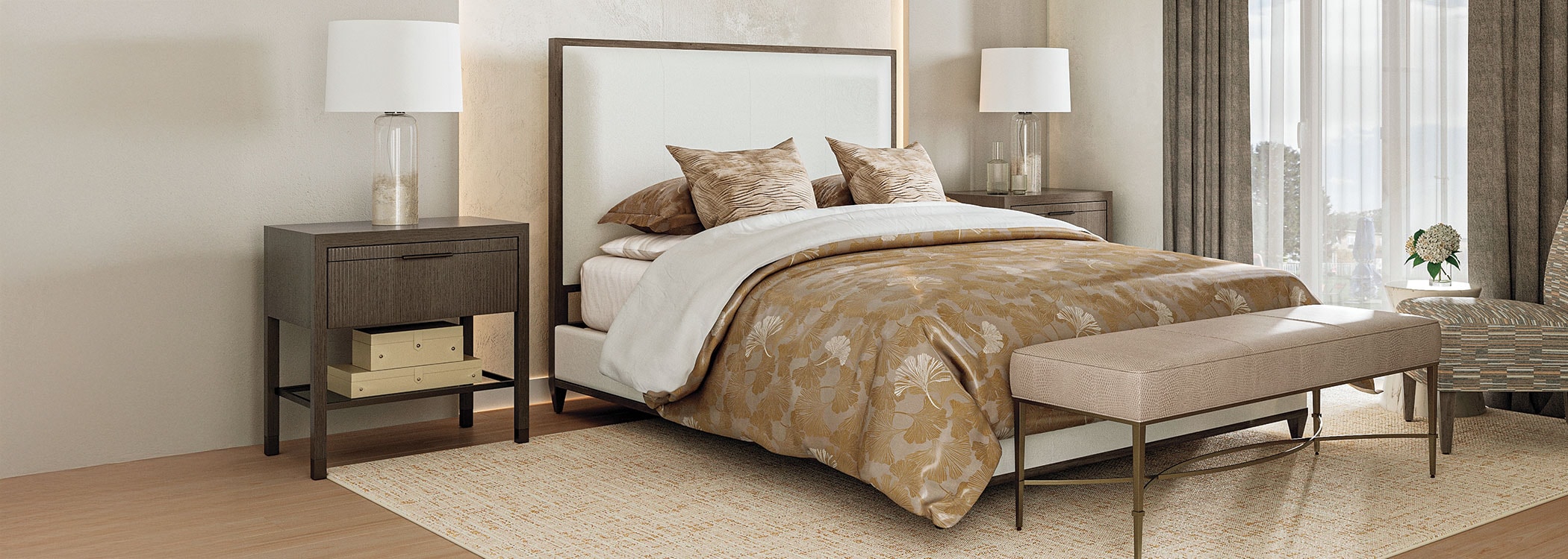 Elegant bedroom with beige decor, king-size bed, end tables, and a bench