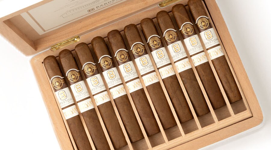 Open wooden cigar box containing multiple Bardstown cigars with white labels