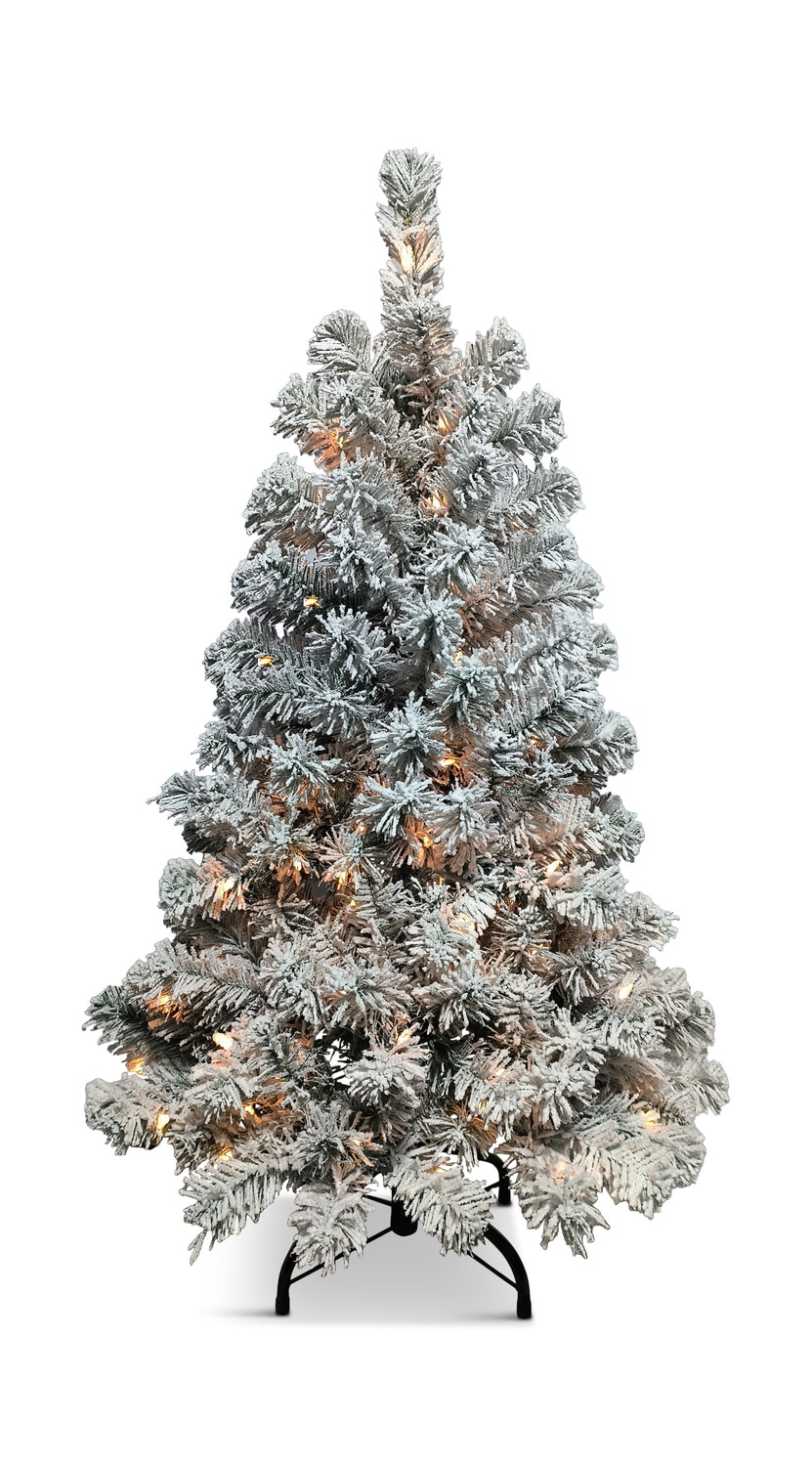 Artificial Christmas tree with snowy branches on a white background