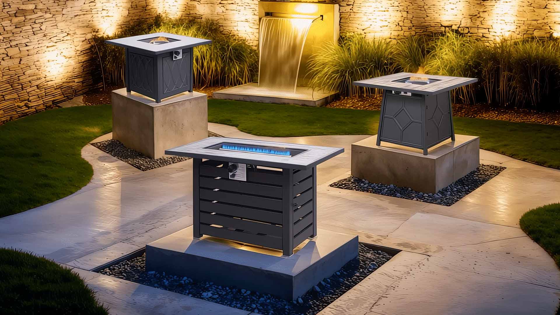 Outdoor kitchen counters with built-in grills, amid landscaped garden at dusk