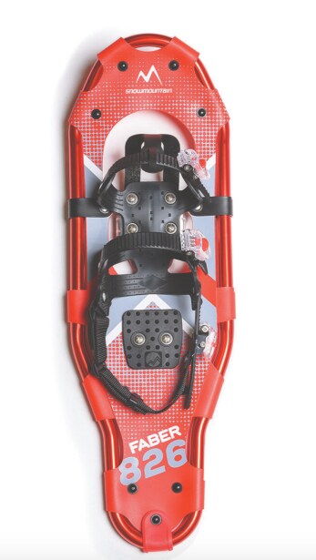 A pair of red snowshoes in the snow