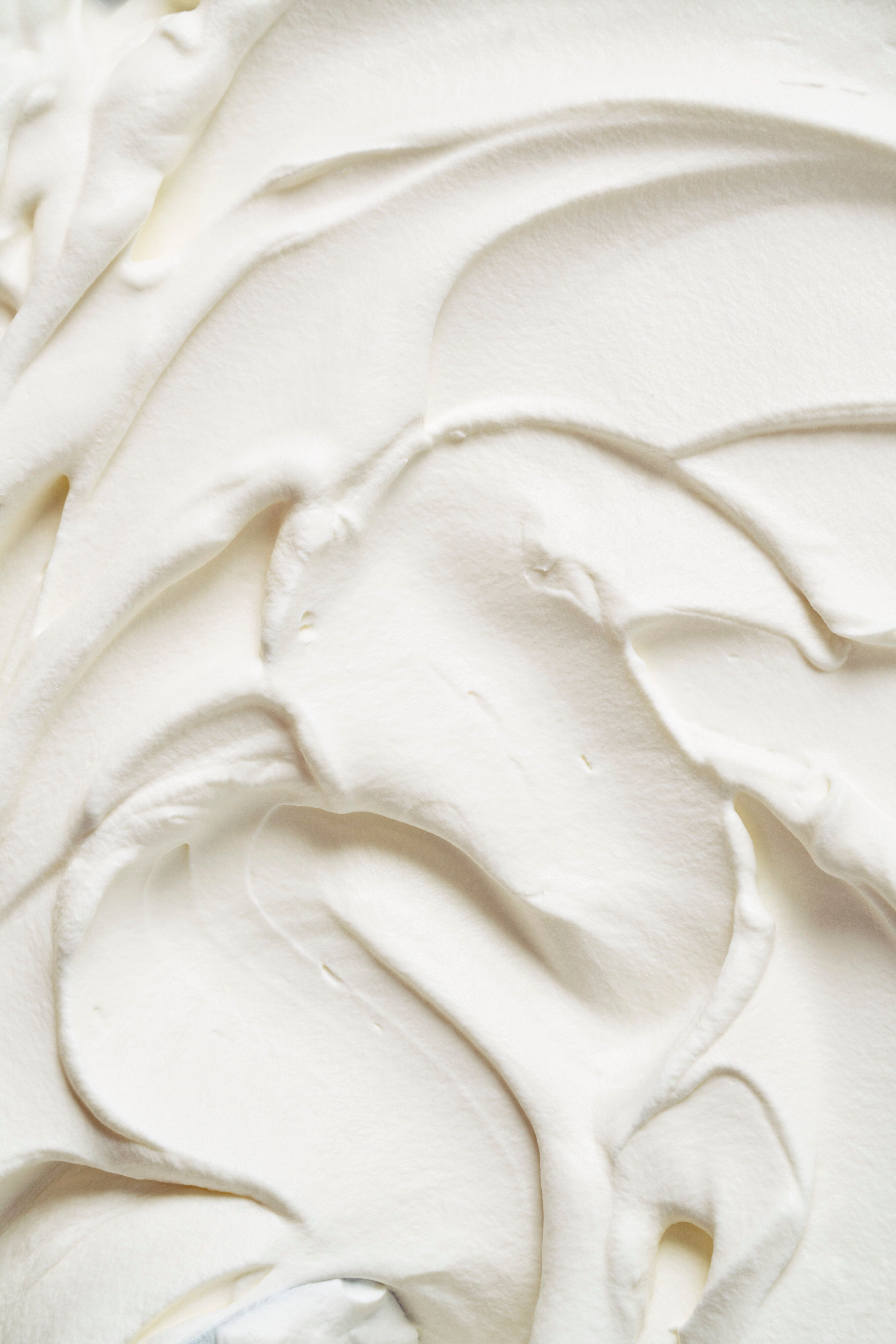 Close-up of swirling white cream texture
