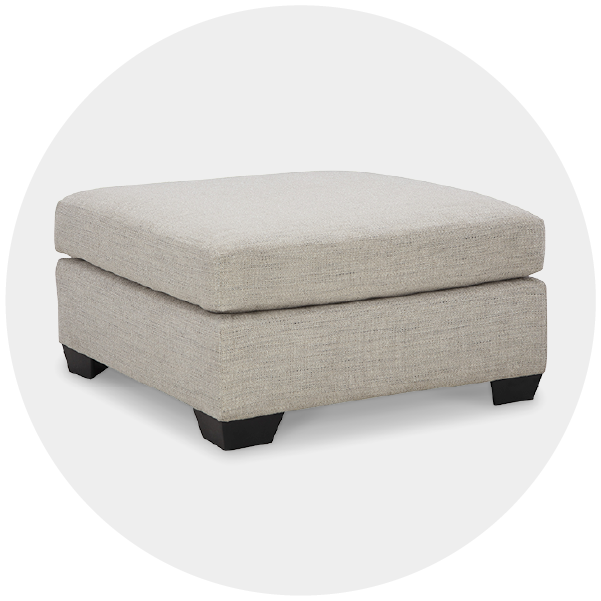 Beige square ottoman on white background