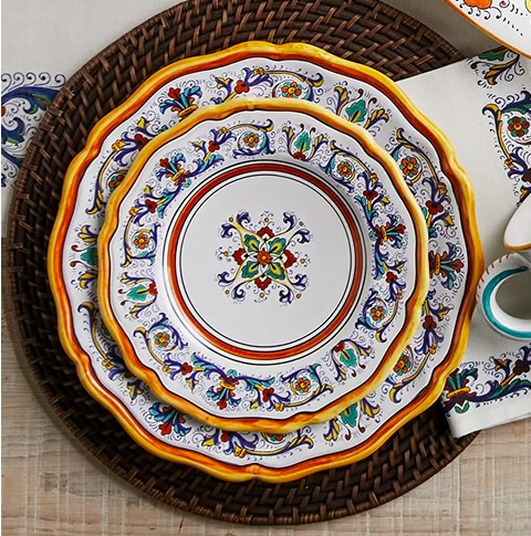 Two Nova Deruta decorative earthenware plates stacked, featuring intricate floral and geometric patterns