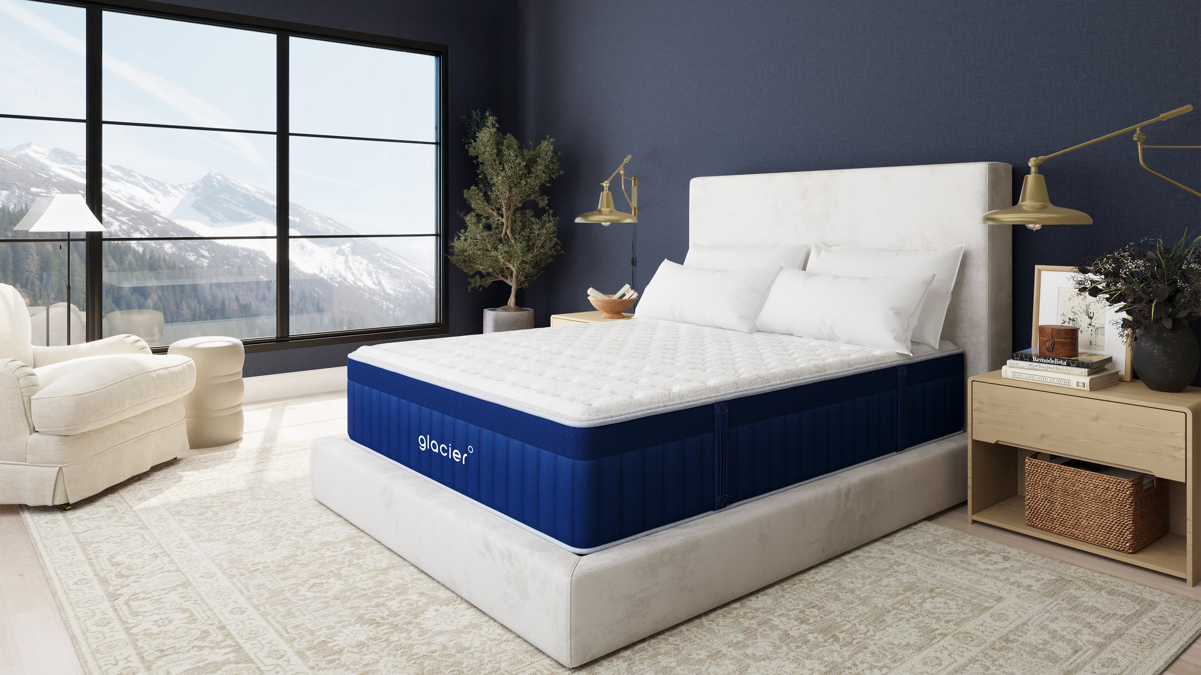 Modern bedroom interior with a bed, nightstand, and a large window showcasing a mountain view
