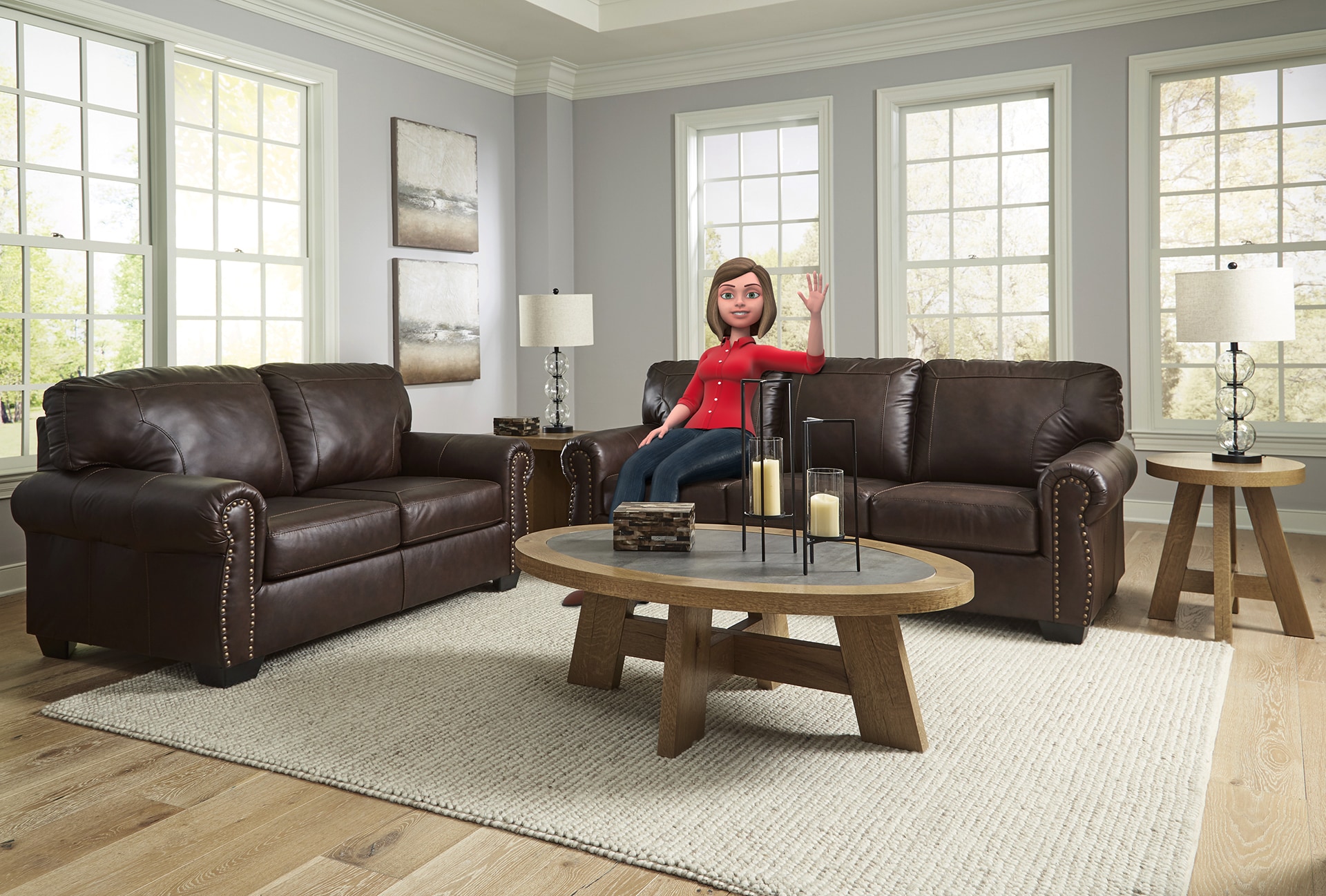 Woman in red shirt sitting in a living room with leather sofas and a wooden table