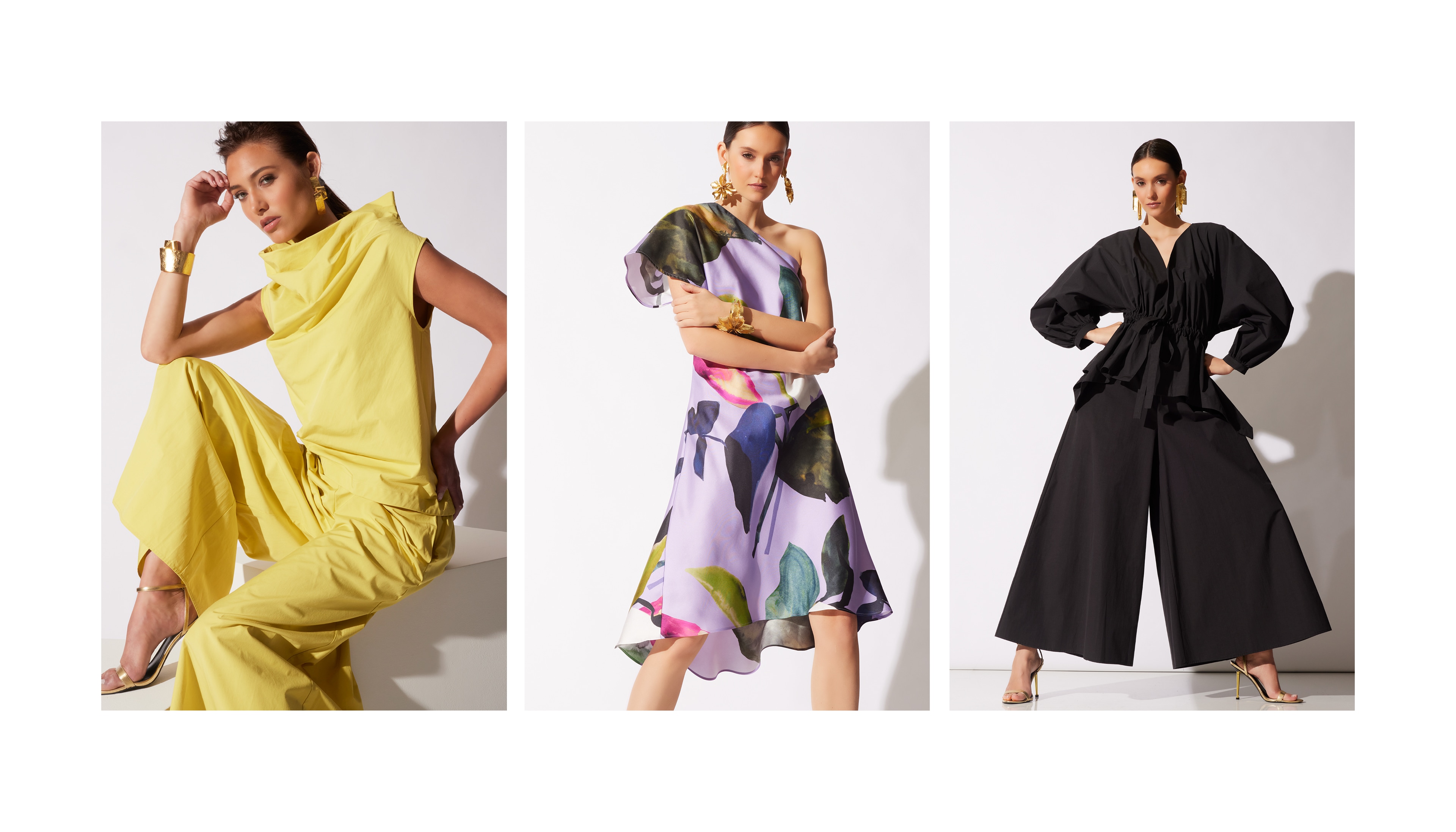 Three women posing in stylish outfits in yellow, printed, and black, against a neutral background