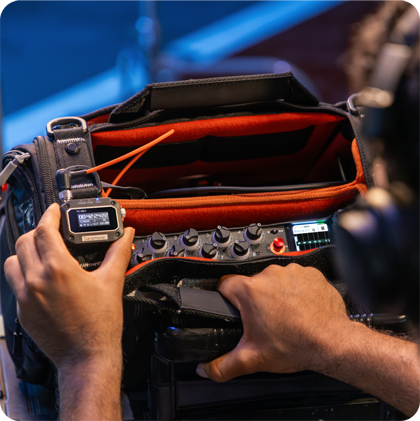 Person operating professional video camera equipment