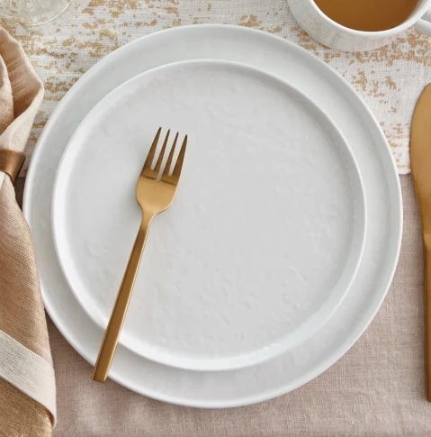 white Coupe salad and dinner plates with gold fork