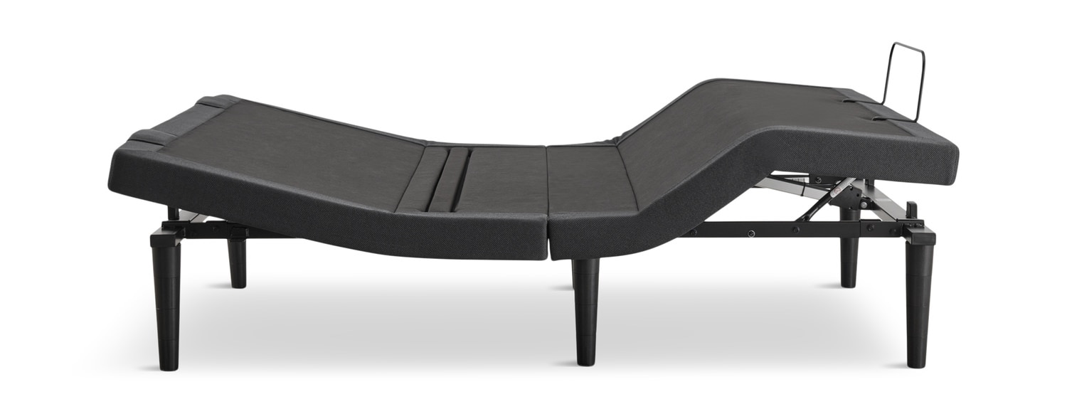 Adjustable black massage table with multiple sections and a headrest