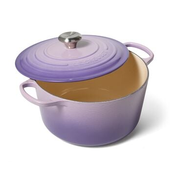 Purple cooking pot with lid, filled with liquid