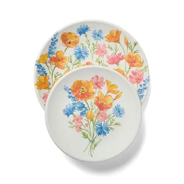 Decorative plate with colorful floral pattern on white background