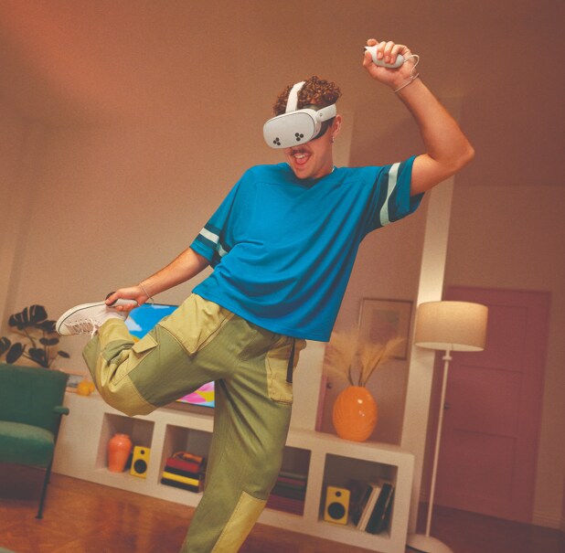 Person enjoying a virtual reality gaming experience.