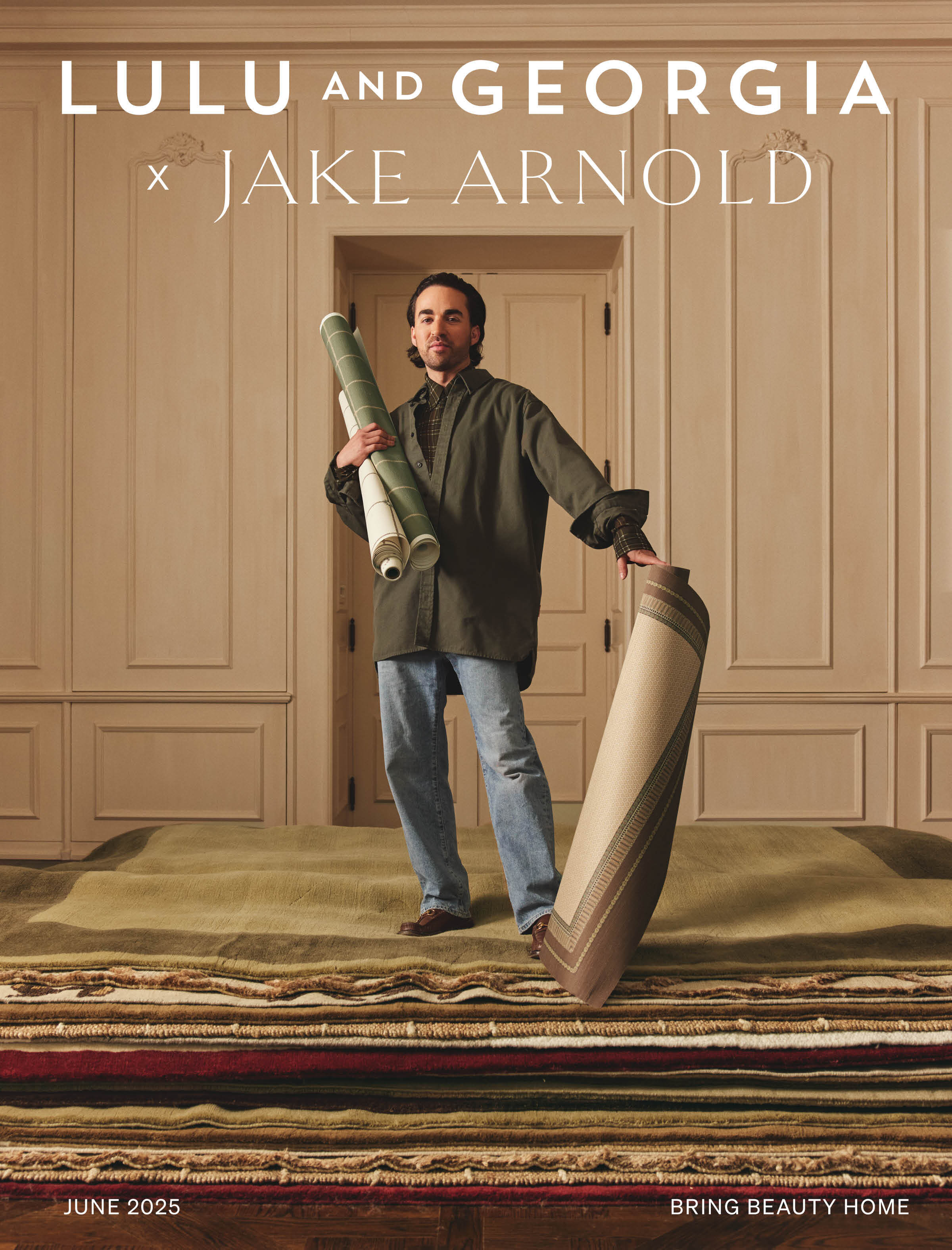 Man holding rug rolls in a room with many stacked rugs, text "Lulu and Georgia x Jake Arnold, June 2023, Bringing Beauty Home