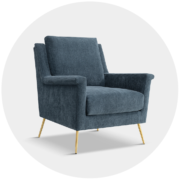 Blue upholstered armchair with golden legs on a white background