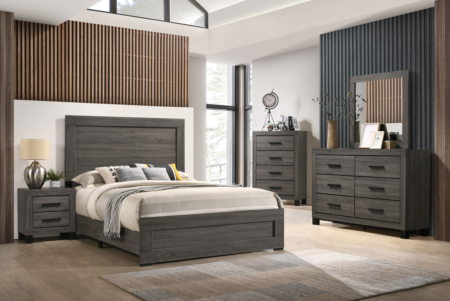 Modern bedroom with a gray bed, matching dresser and nightstand, wooden accents, and light decor