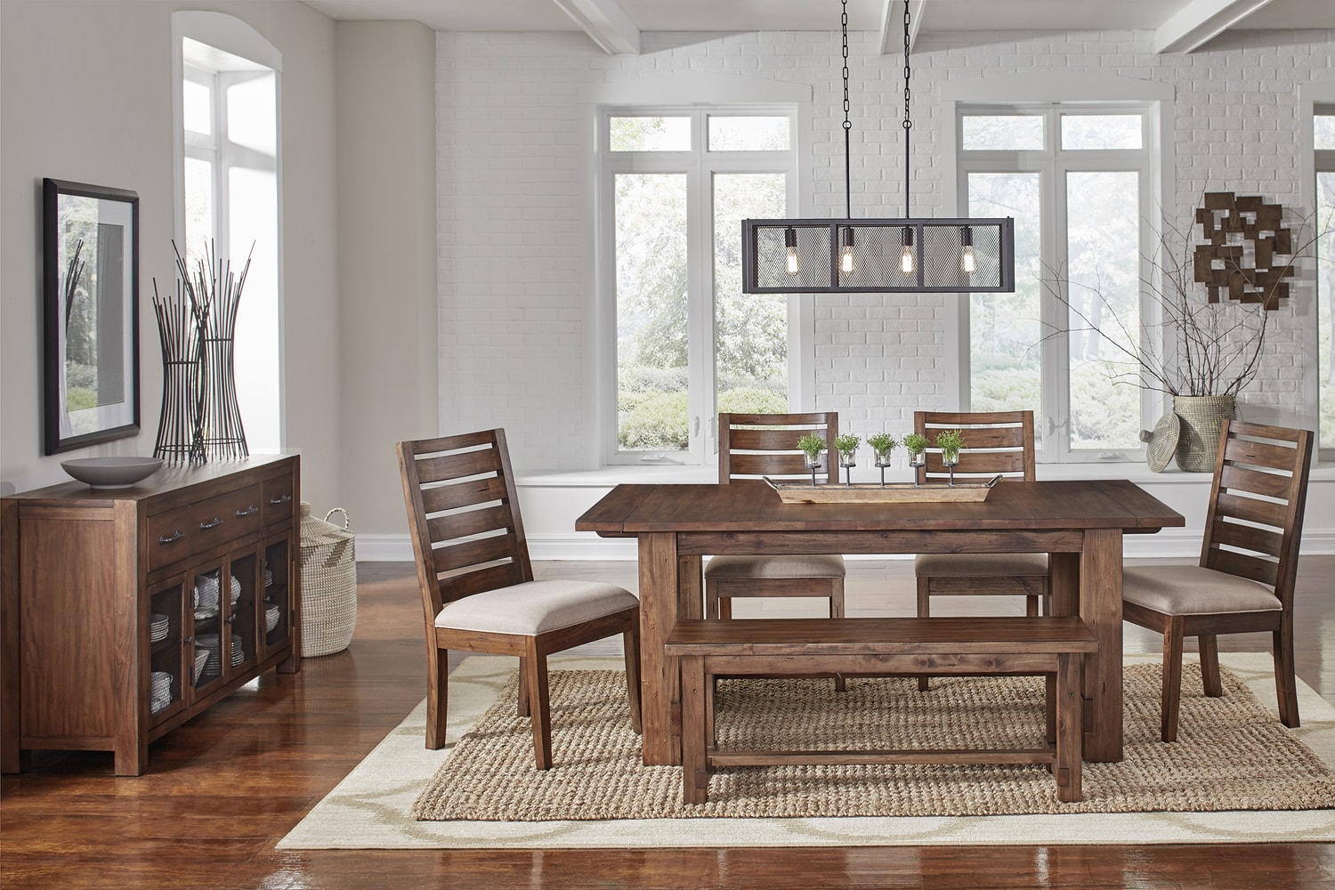 Modern dining room with wooden table, chairs, and a sideboard, large windows in the background