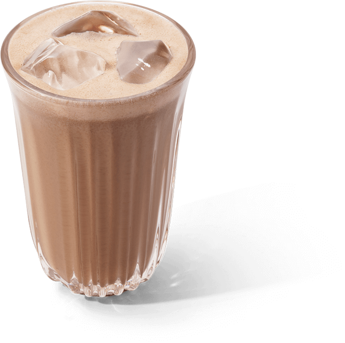 Iced coffee in a clear glass with visible ice cubes