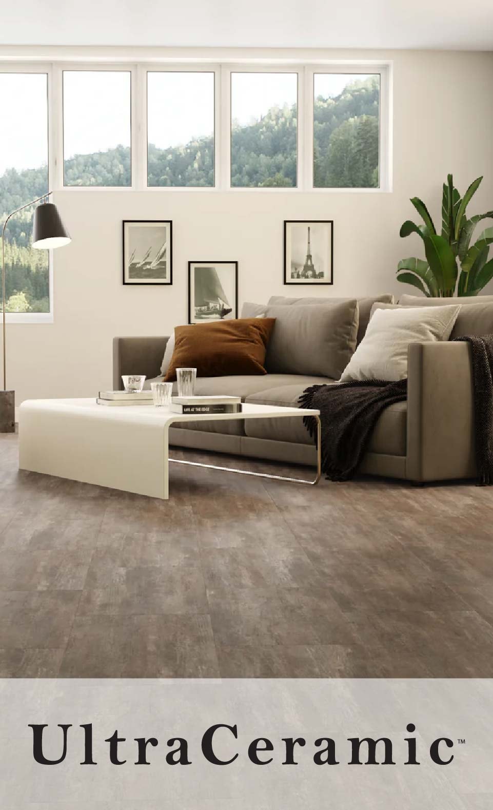 Modern living room with a gray sectional sofa, chaise lounge, and minimalist decor featuring ceramic flooring