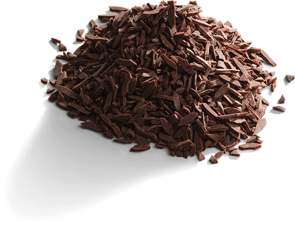A heap of chocolate sprinkles isolated on a dark background