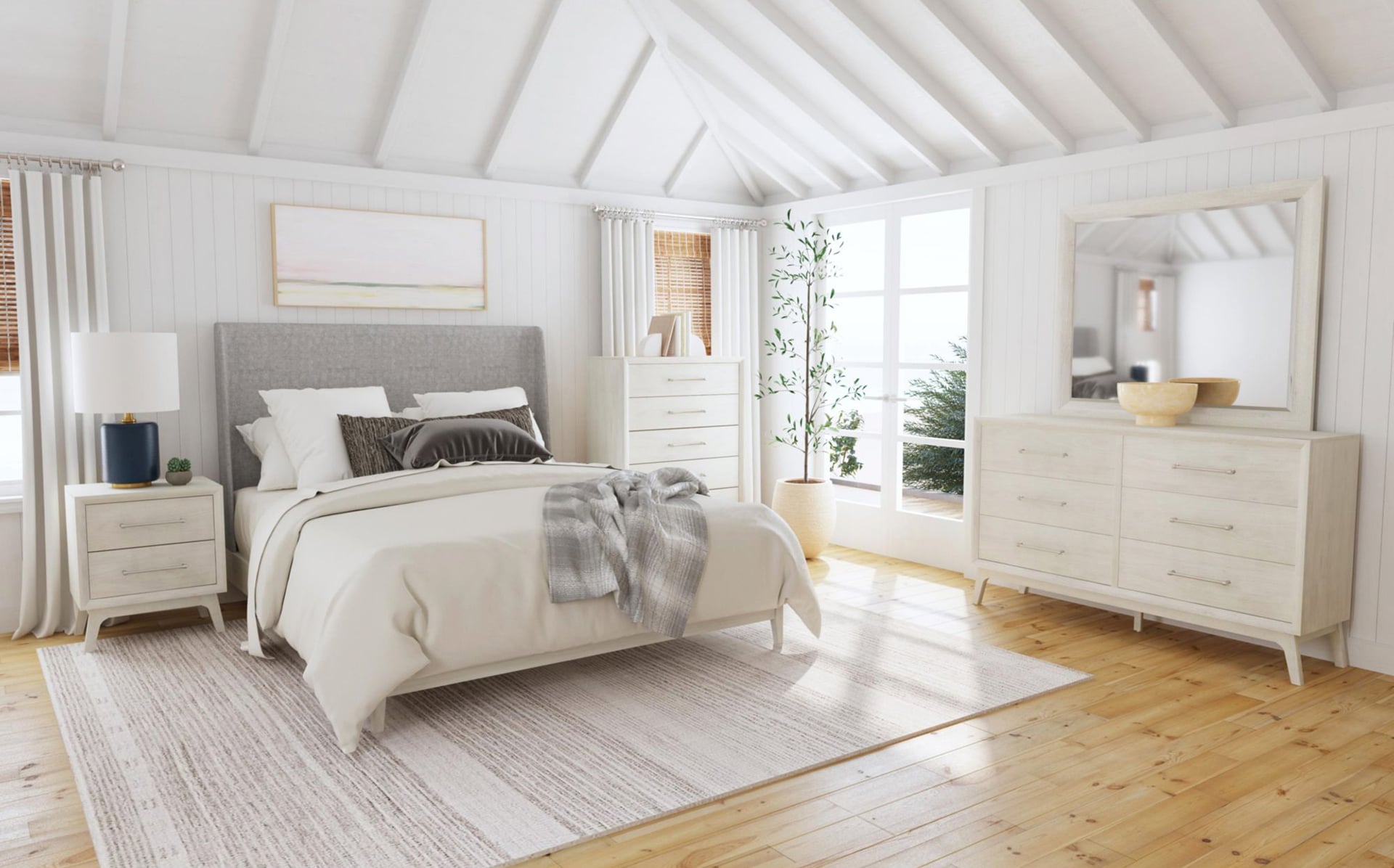 Bright spacious bedroom with a double bed, dresser, and coastal decor