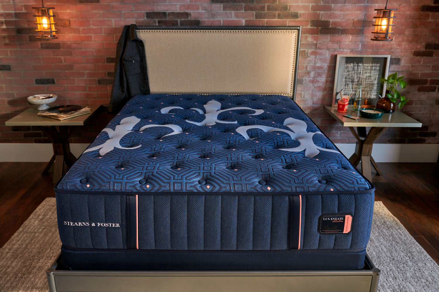 Luxury mattress in a cozy bedroom with side tables and ambient lighting