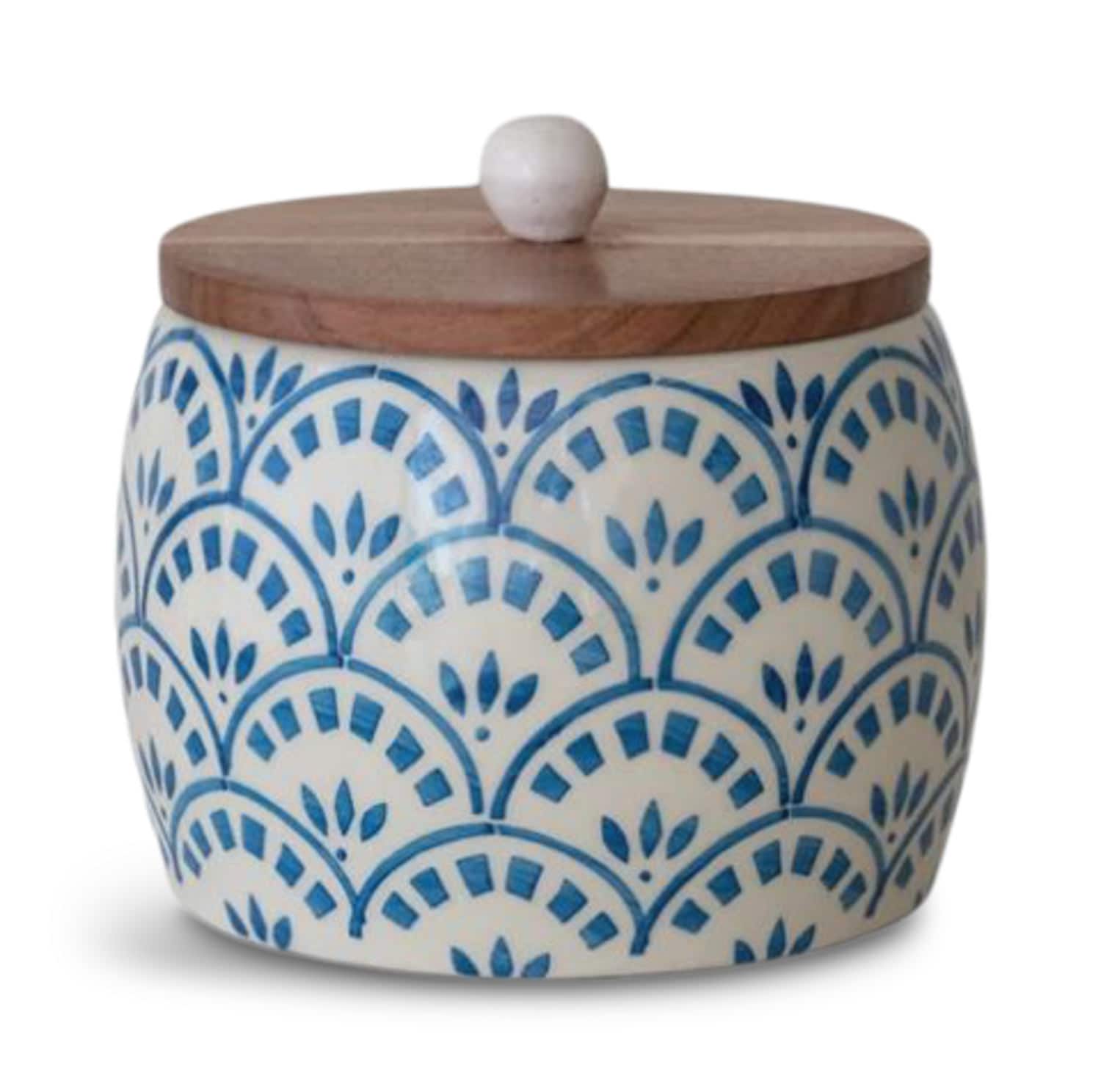 White and blue patterned ceramic jar with wooden lid
