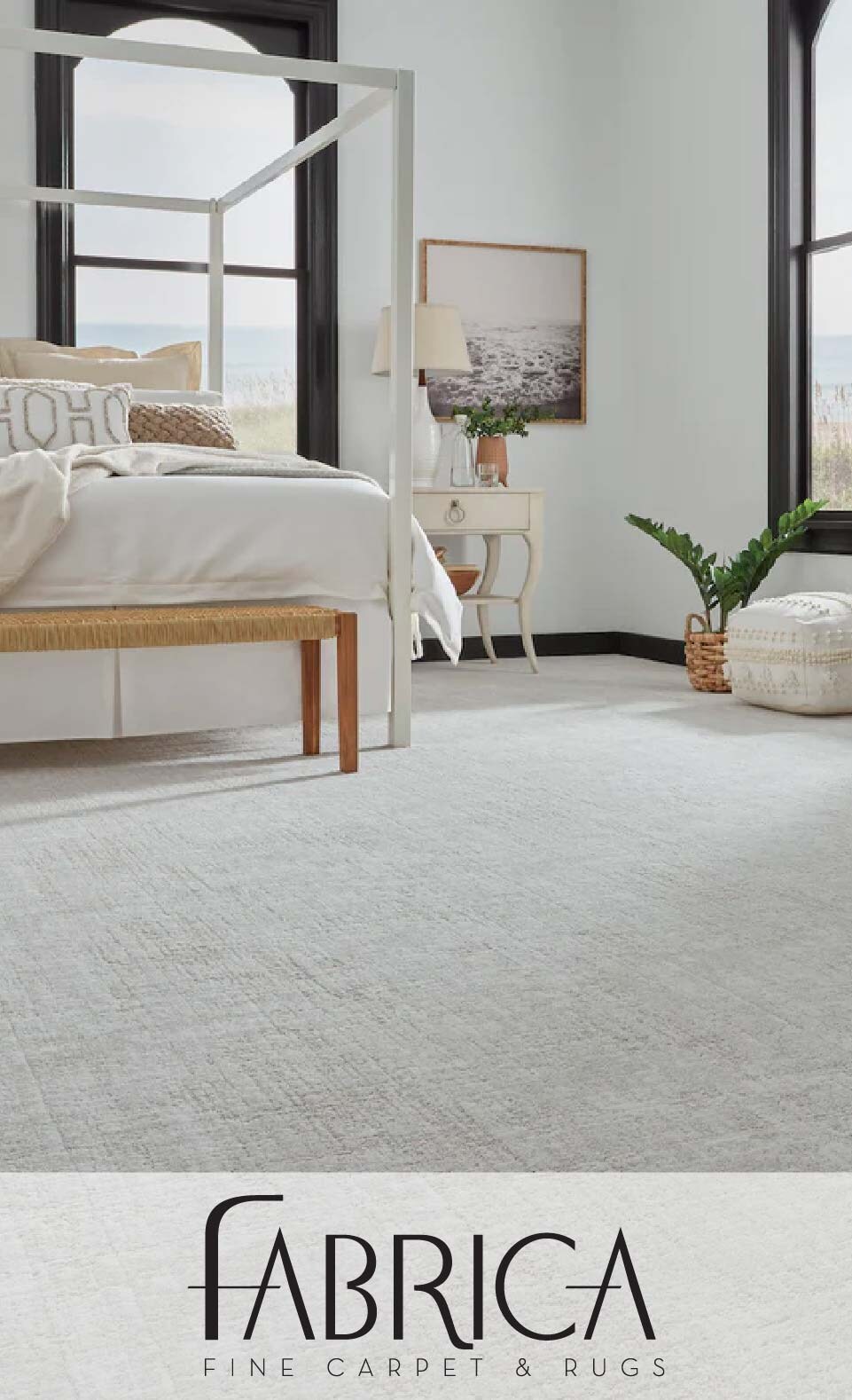Modern bedroom with white carpet from Fabrica, showing bed, chair, and plant