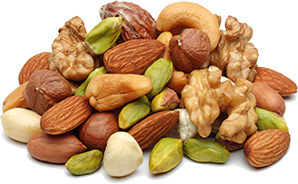 Assortiment de noix variées incluant amandes, pistaches et noix de cajou