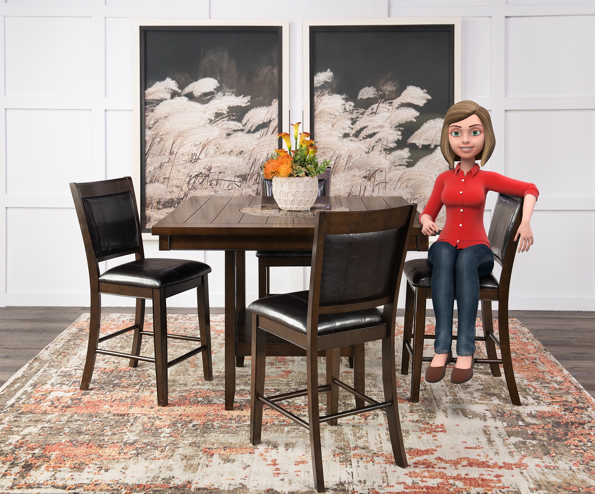 Ali sitting at a dining table with two chairs and abstract wall art