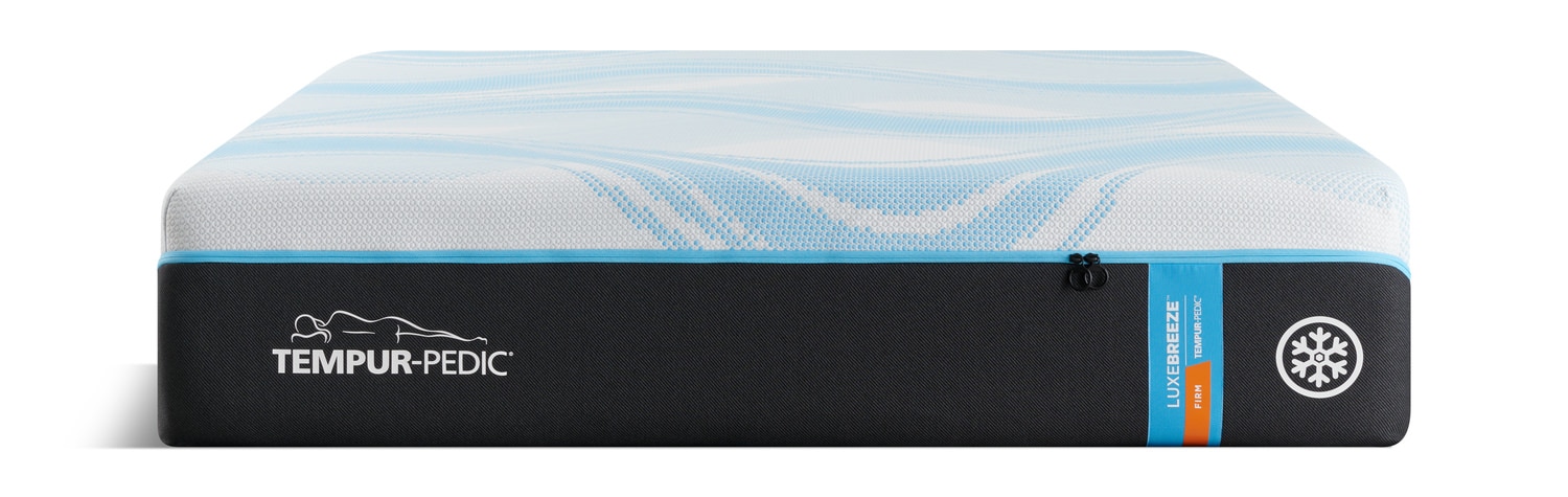 Side view of a TEMPUR-Pedic mattress with logo visible