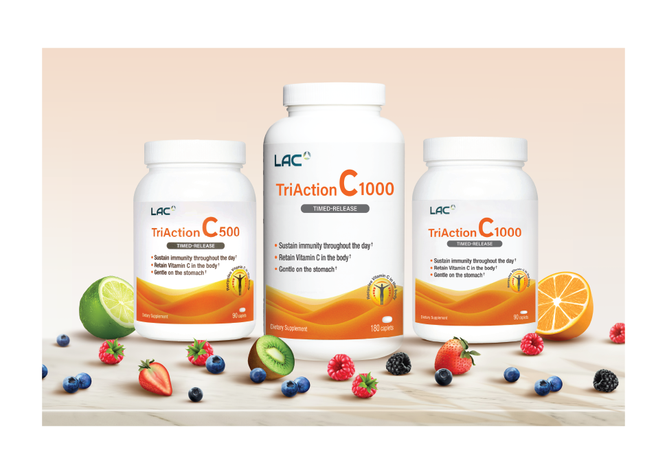 Two bottles of LAC TautCtion C-1000 supplements with citrus fruits and berries