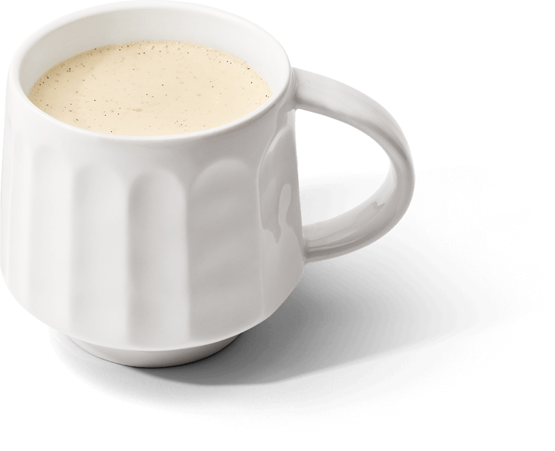 White ceramic mug filled with coffee on a white background