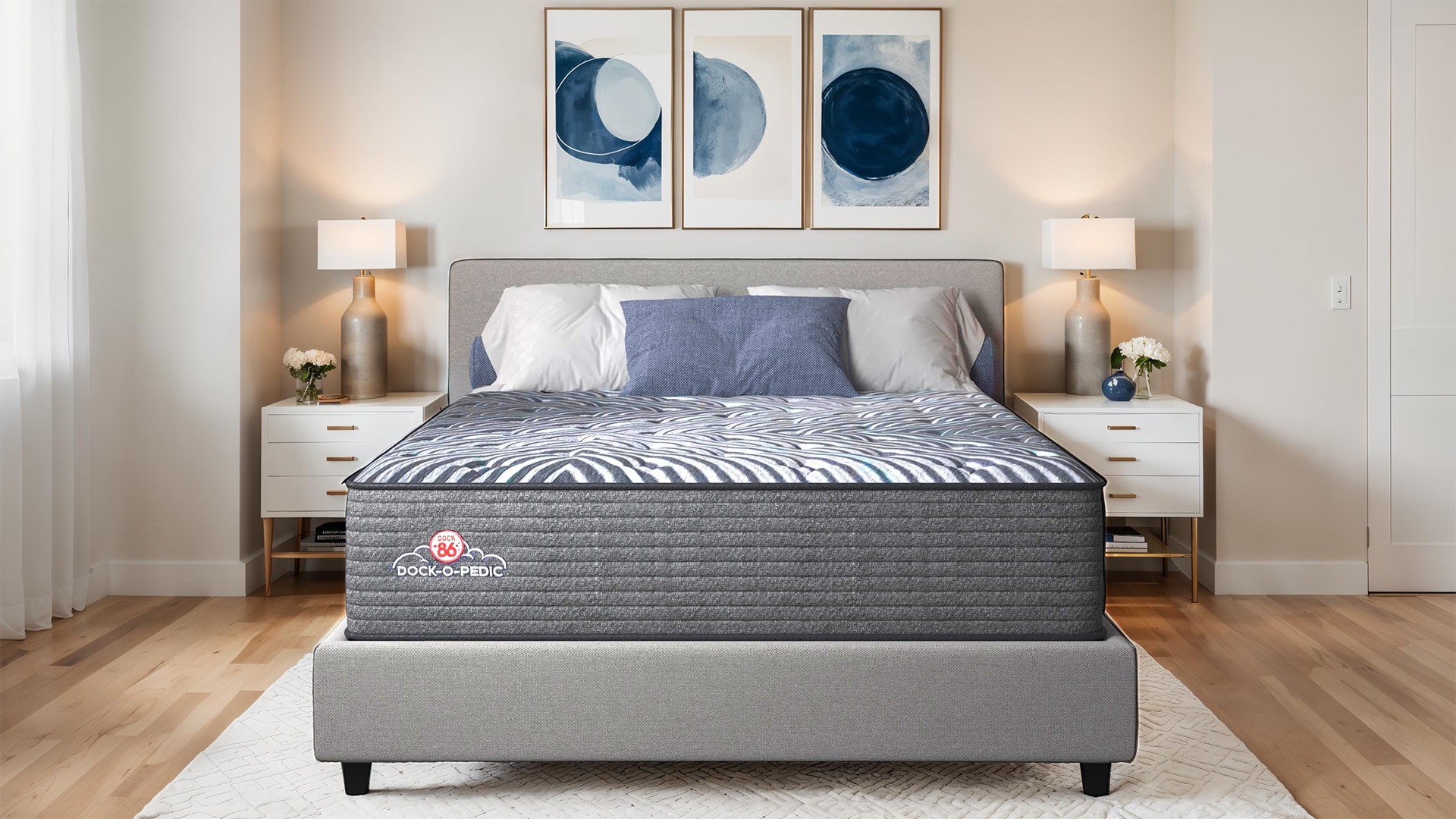 Modern bedroom with double bed, two nightstands, and blue art above bed