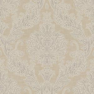 Seamless pattern of elegant, intricate beige floral damask design on a textile background