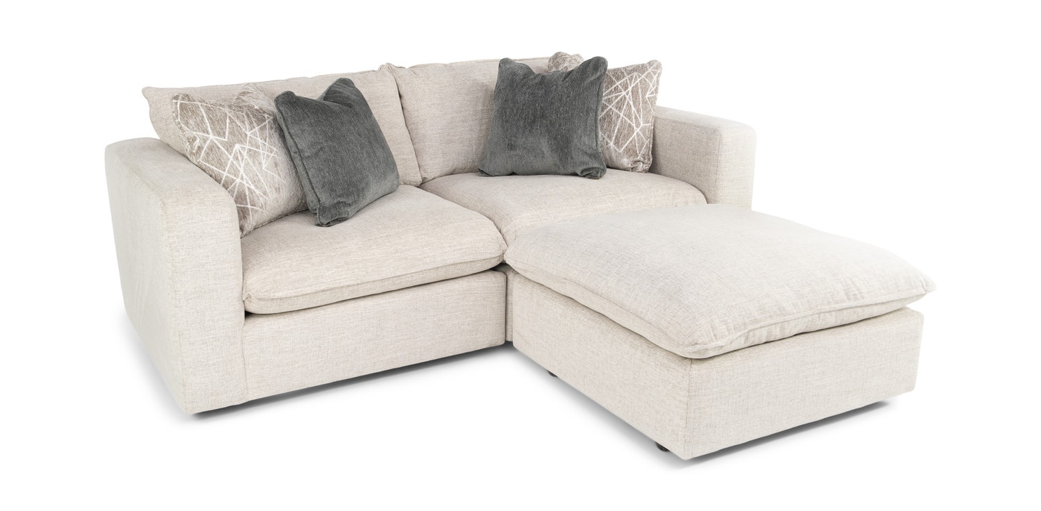 Beige sectional sofa with chaise and cushions