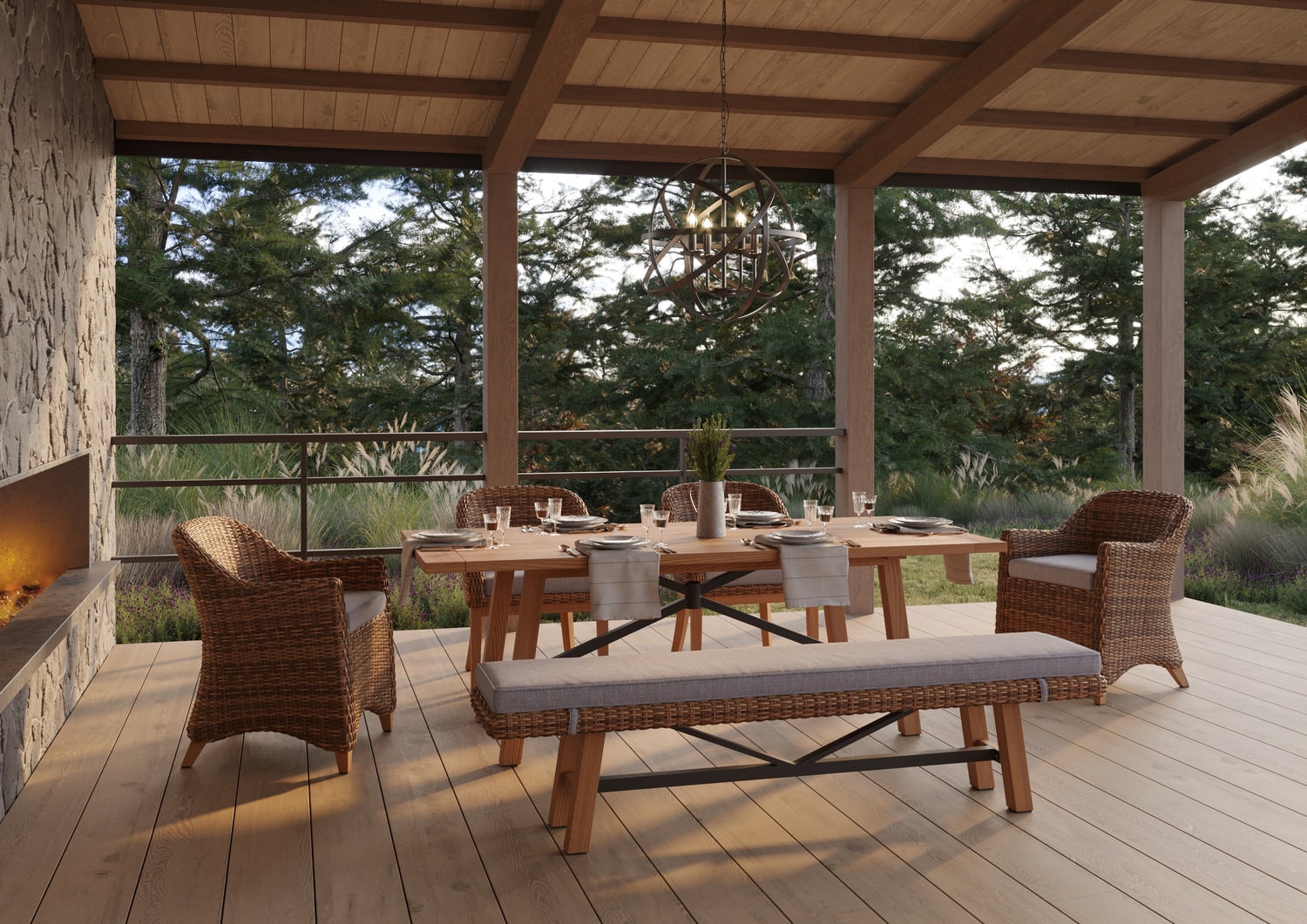 Wooden patio furniture on a covered deck overlooking trees