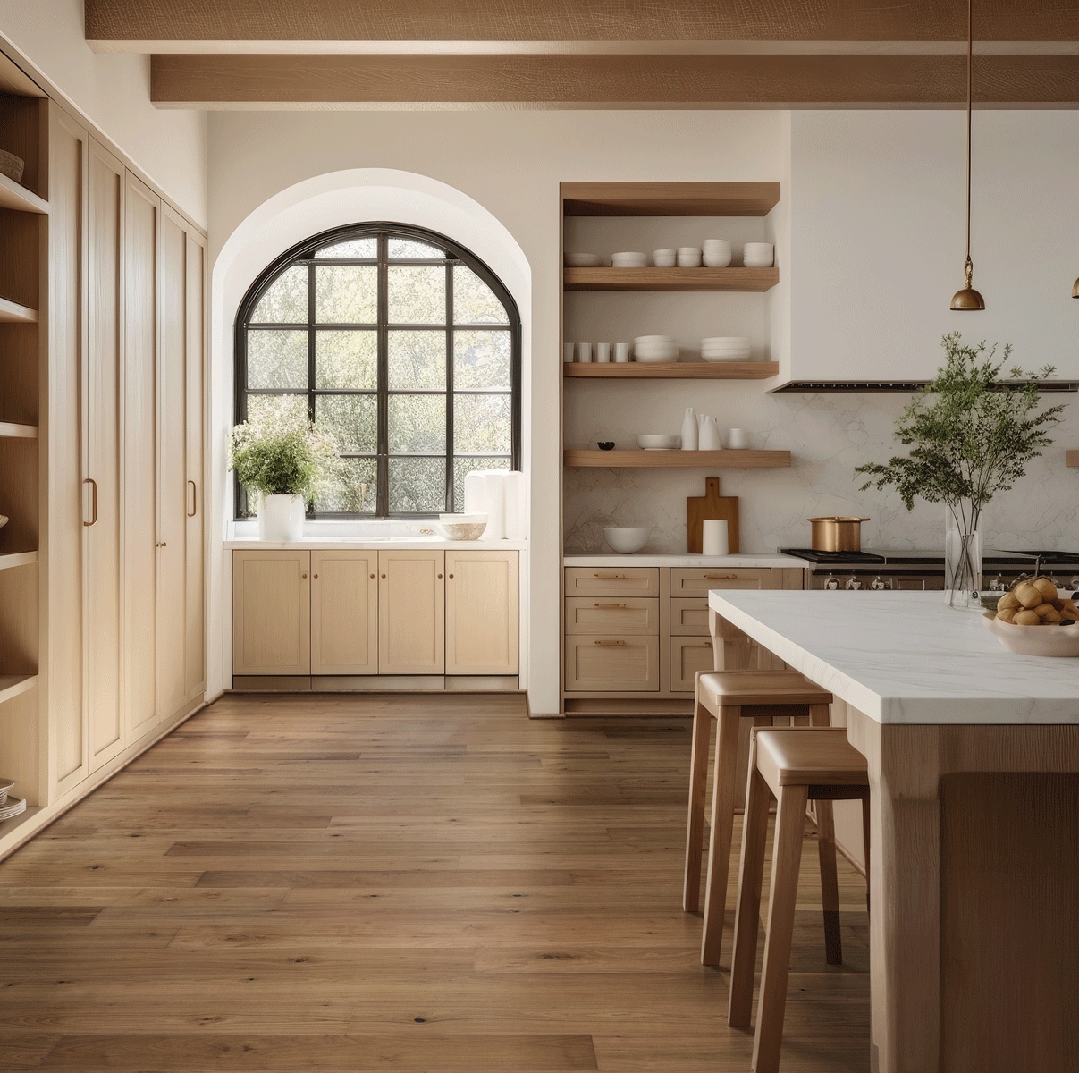 Modern kitchen with wooden island, shelves, and arched window
