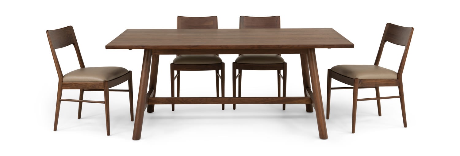 A modern dining set with one table and six chairs on a white background